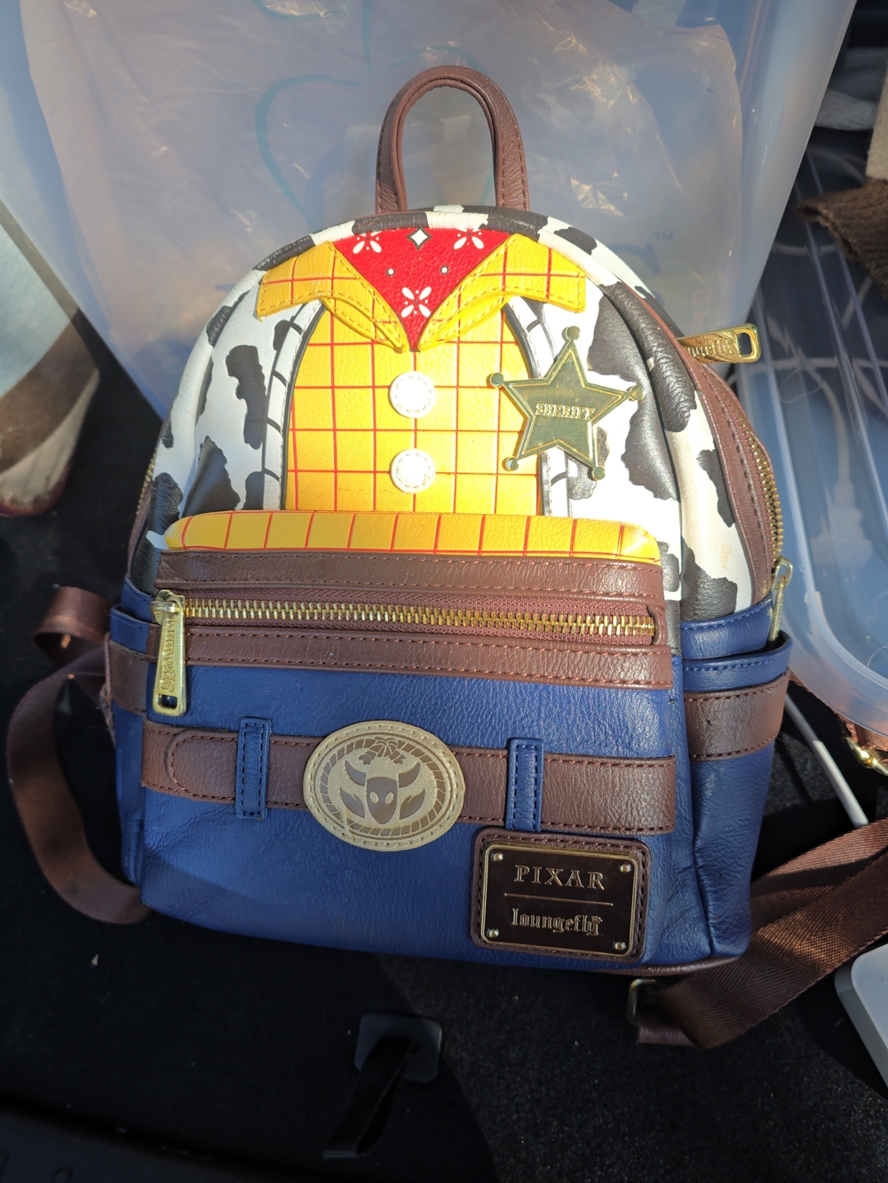 Loungefly Pixar Woody Mini Backpack in Blue, Brown, Yellow, White, Red